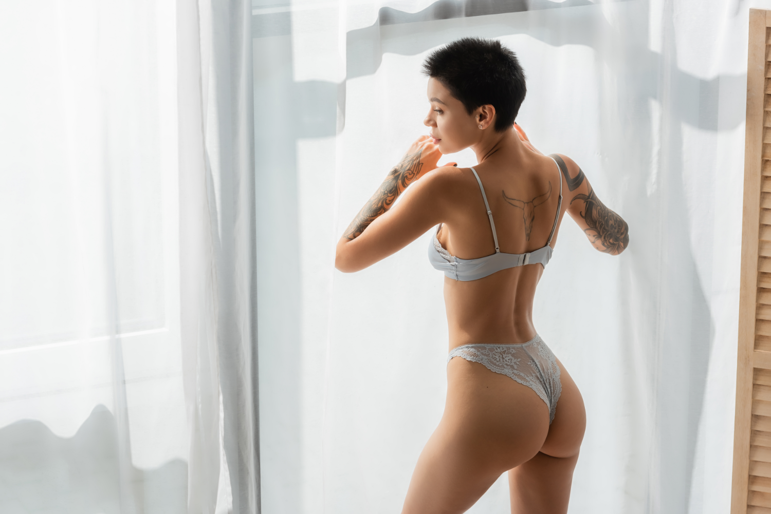 young-and-stunning-woman-with-sexy-tattooed-body-a-2023-11-27-04-49-18-utc